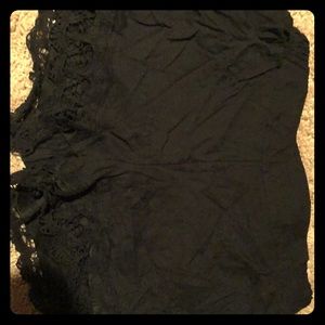 A pair of xhilaration black shorts